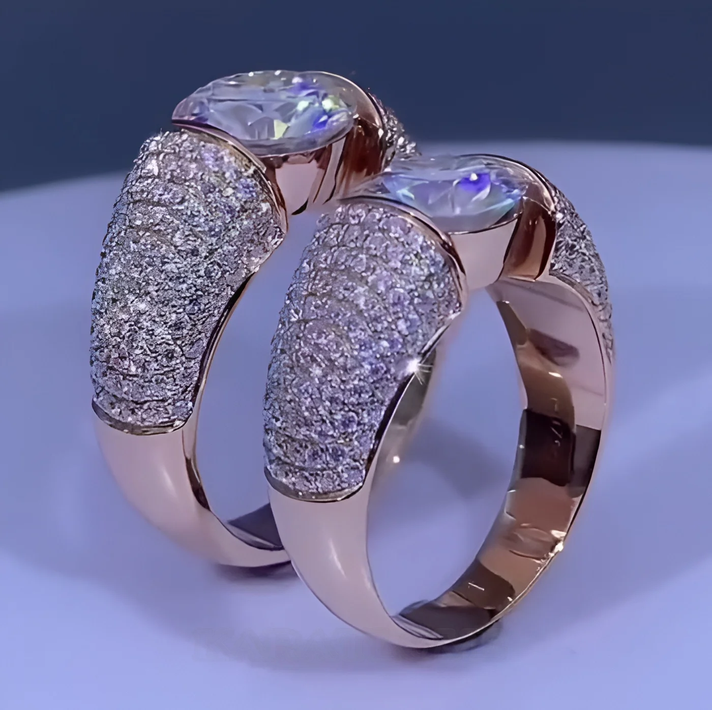 Paar-Ringe aus rosévergoldetem Sterlingsilber mit Brillantschliff-Diamant
