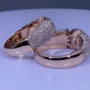 Paar-Ringe aus rosévergoldetem Sterlingsilber mit Brillantschliff-Diamant
