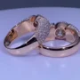 Paar-Ringe aus rosévergoldetem Sterlingsilber mit Brillantschliff-Diamant