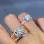 Paar-Ringe aus rosévergoldetem Sterlingsilber mit Brillantschliff-Diamant