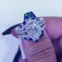 Ovalschnitt Diamantweiß Saphirblau 925er Sterlingsilber Einlege Halo Trauring-Set