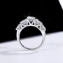 Rundschliff Moissanite Diamantweiß 925er Sterlingsilber Art-Déco Verlobungsring