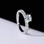 Rundschliff Moissanite Diamantweiß 925er Sterlingsilber Klassisch Verlobungsring