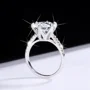 Rundschliff Moissanite Diamantweiß 925er Sterlingsilber Klassisch Verlobungsring