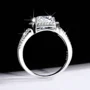 Rundschliff Moissanite Diamantweiß 925er Sterlingsilber Halo Verlobungsring
